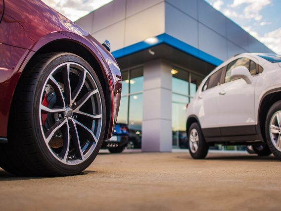 closeup-of-red-car-wheel.png