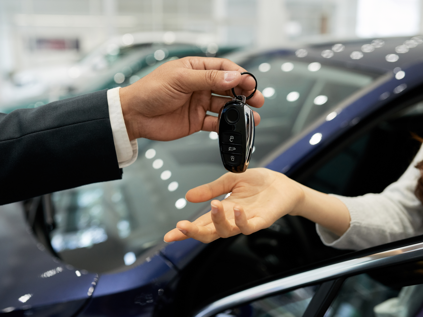 Handing over car keys at dealership